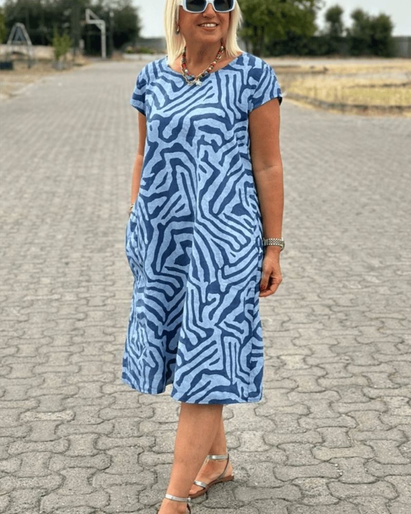 Hallie | elegantes Sommerkleid mit Rundhalsausschnitt und hübschem Print