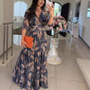 Xeren | Maxikleid mit V-Ausschnitt und voluminösen Ärmeln