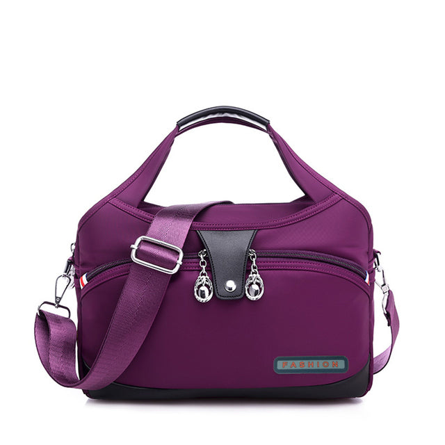 Zamira | Modische, stylische Handtasche mit Diebstahlschutz - Lila
