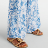 Rora | Set aus Kleid, Jumpsuit, Badeanzug und Rock mit passendem Druck