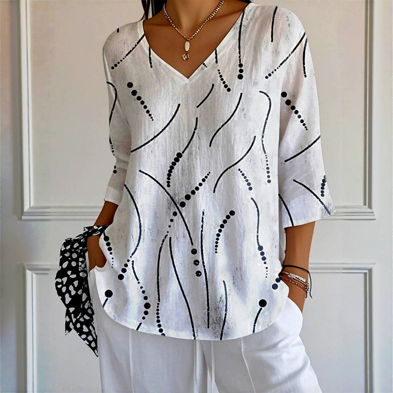 Casa | Gepunktete High-Low-Bluse