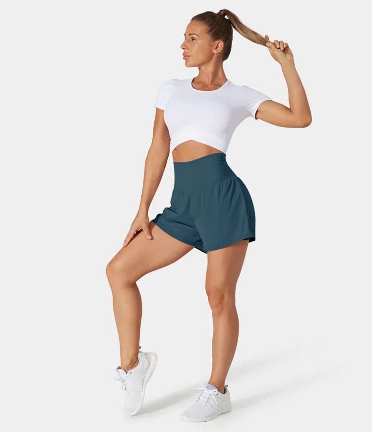 China | Sportliche Shorts mit hoher Taille und fließendem Oberstoff