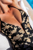 Zoey | modischer Badeanzug mit tiefem Ausschnitt und floralem Design