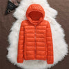 NordicBreeze™ - Wetterfeste Daunenjacke - Damenjacke - Orange / S
