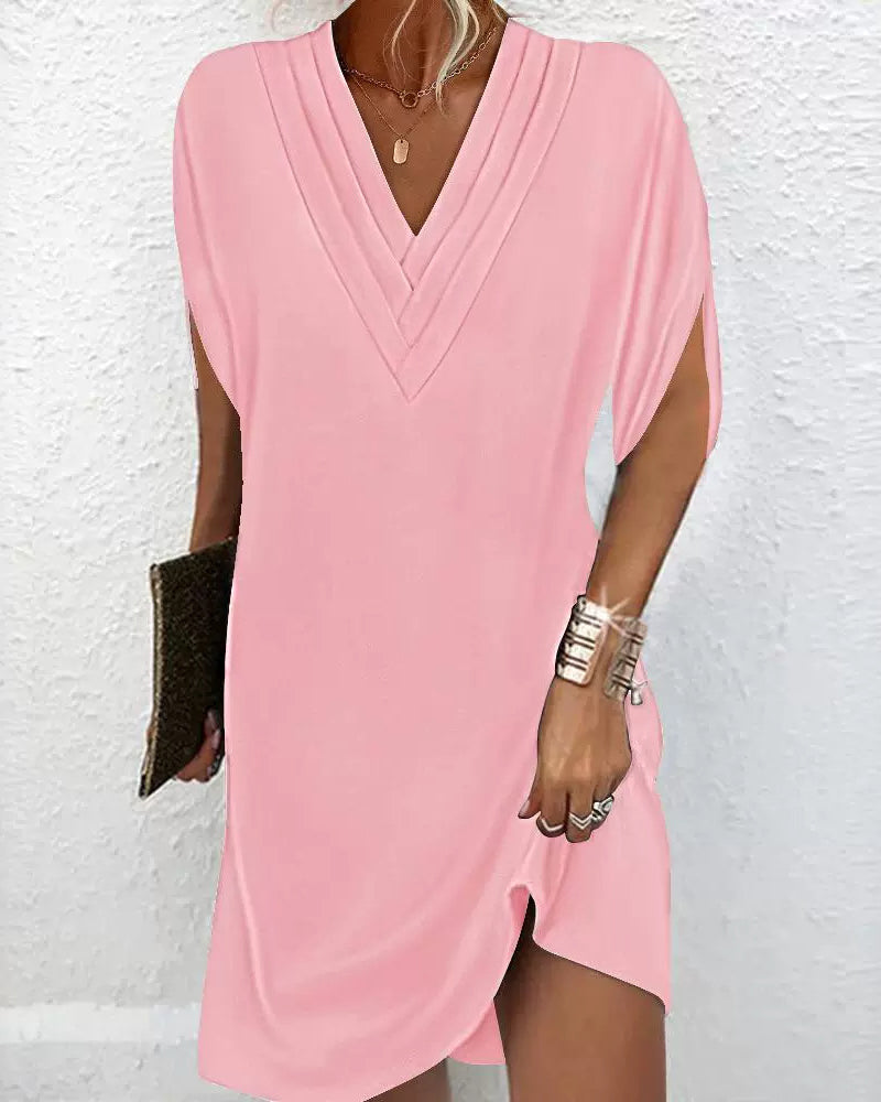 Estelle™ | Elegantes, einfarbiges Kleid mit geschlitzten Ärmeln